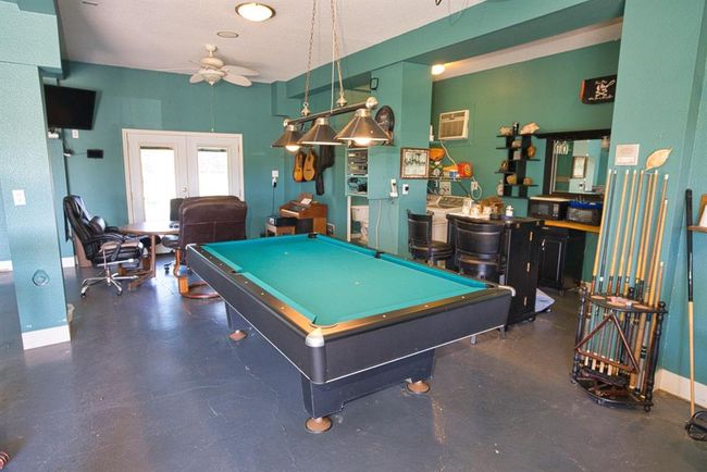 Game Room, 1/2 bath, washer/dryer, Bar | Image 8