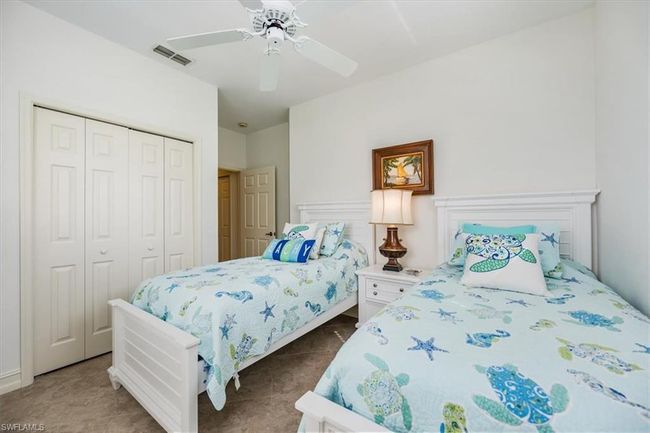 Bedroom with a closet and ceiling fan | Image 17