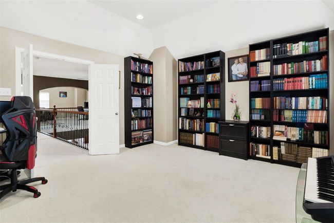 This fourth living area is great for gaming or home office, exercise, or hobby space | Image 30