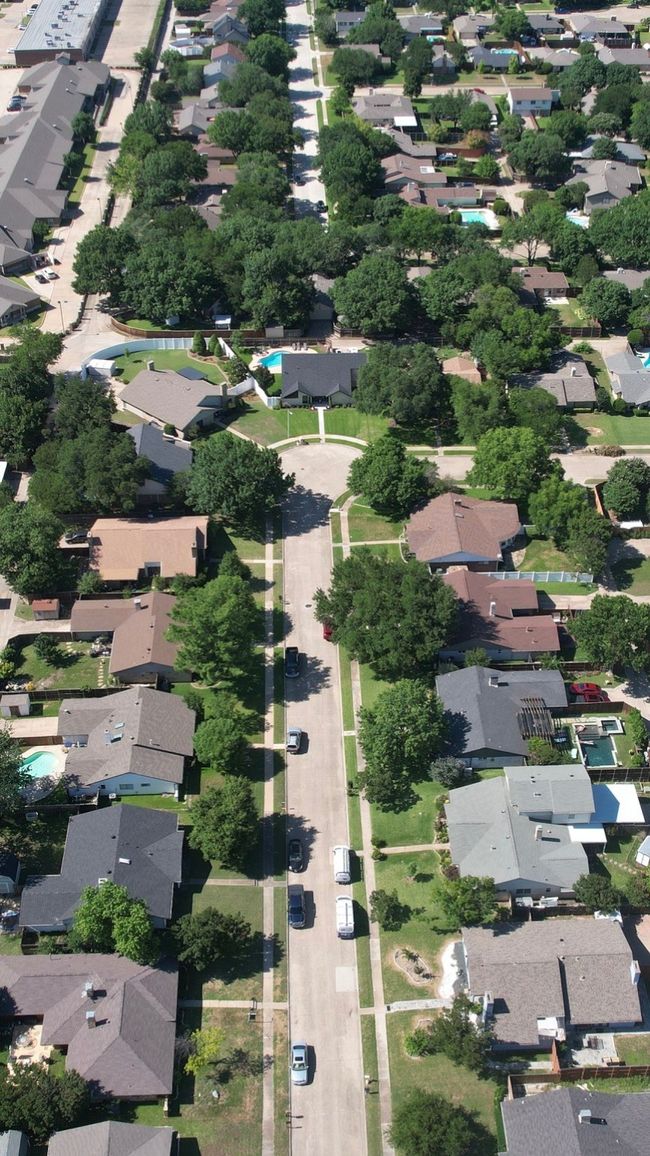 Aerial view of property's location with nearby suburban area | Image 39