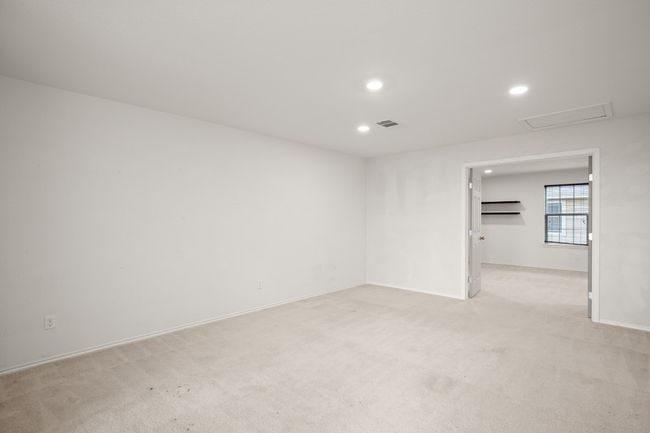 Unfurnished room with recessed lighting, baseboards, visible vents, and light carpet | Image 24