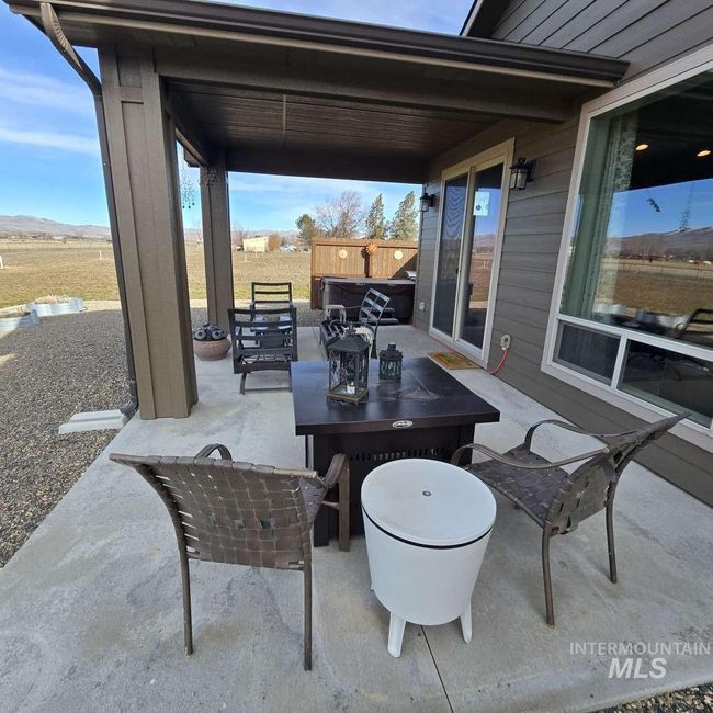 View of patio featuring outdoor dining space | Image 22
