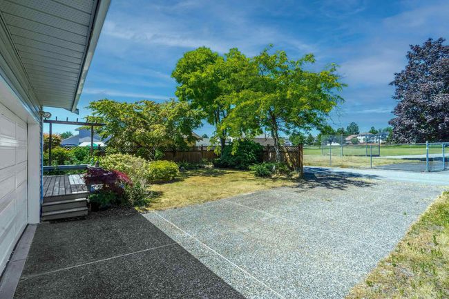 Exterior space with a lawn and fence | Image 23