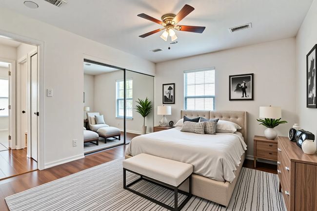 Primary Bedroom with wood finished floors, a closet, and a ceiling fan. This room has been virtually modified and staged to show potential. | Image 18