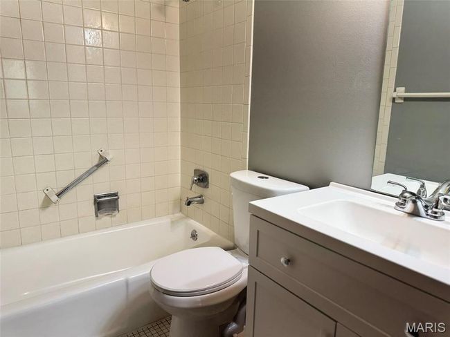 Full bathroom with vanity and shower combination | Image 18