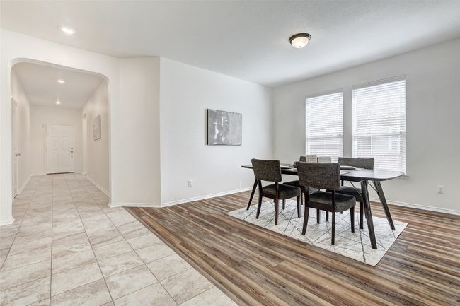 Dining area with lots of natural light | Image 8