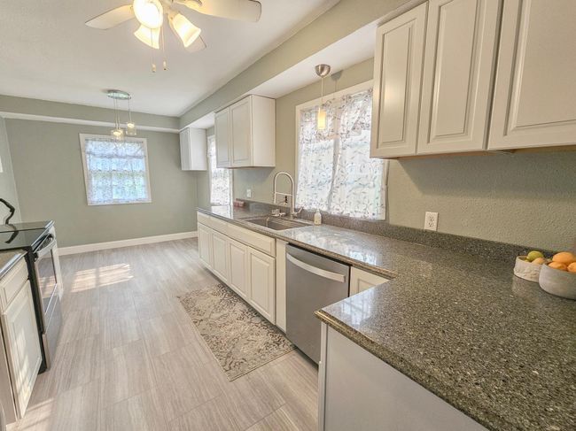 Beautiful Updated Kitchen in 2021 with Breakfast Area | Image 9