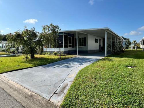 1005 Thrush Cir, Barefoot Bay, FL, 32976-7522 | Card Image