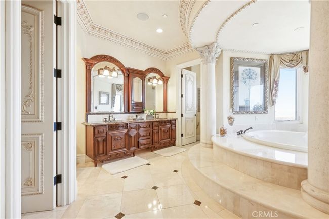 Primary Bath with stately tub. | Image 43
