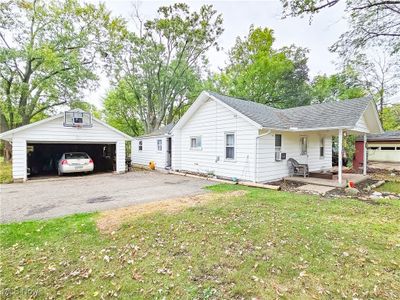 One story home with 2 car detched garage and porch | Image 1