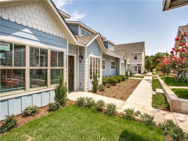 View from the west of of the one story duplex which contains 407 Cedar Street Apt 1 | Image 18