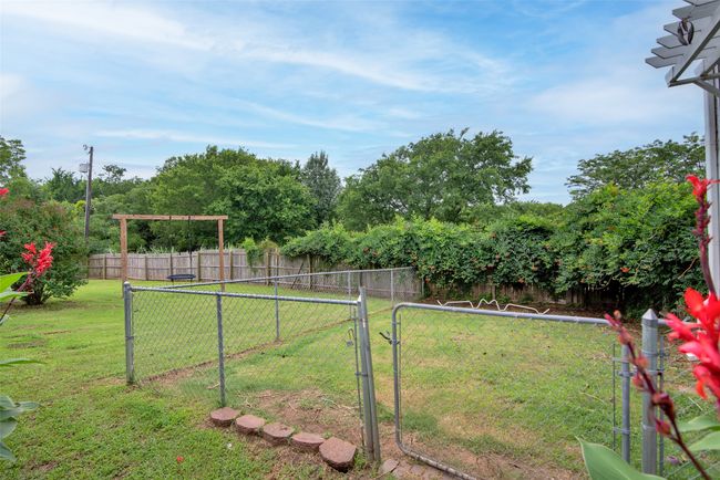 Fenced dog run at the rear of the home | Image 36