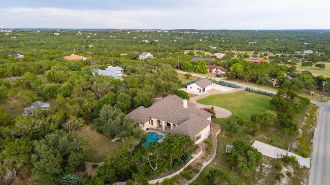 Aerial overview of property's location featuring a pool area | Image 38