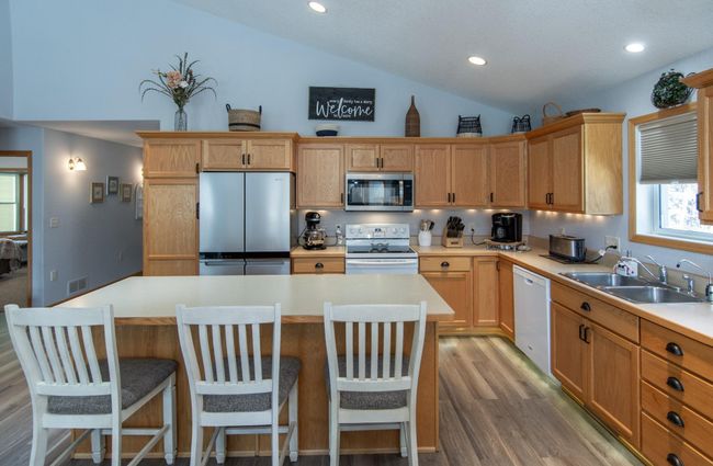 Kitchen with center island and lots of cabinet space | Image 18