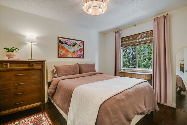 Spacious yet cozy secondary bedroom. | Image 14
