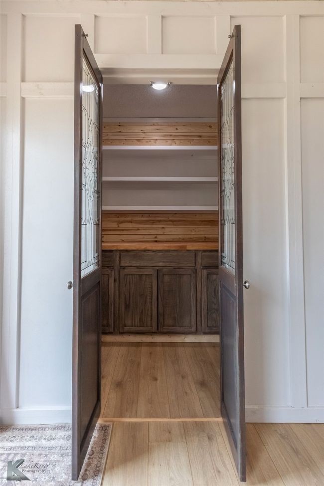 Bathroom featuring wood finished floors | Image 14