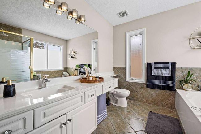 21 Silverstone Mews Nw, Home with 4 bedrooms, 3 bathrooms and 6 parking in Calgary AB | Image 16