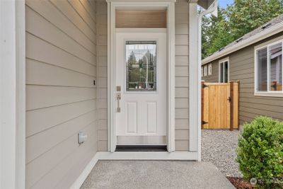 Covered front porch. Photo for illustration only of same plan on a different lot, not actual. | Image 3