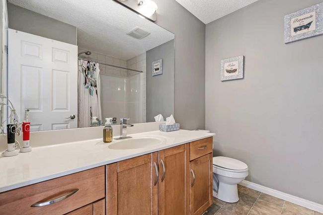 716 Boulder Creek Drive Se, House other with 4 bedrooms, 4 bathrooms and 4 parking in Langdon AB | Image 27