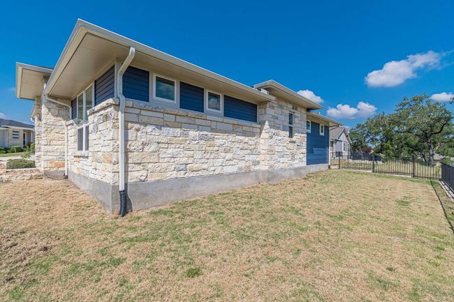 View of property exterior featuring stone siding | Image 32