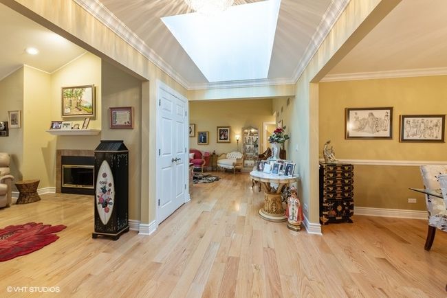 Spacious Foyer has Skylight | Image 5