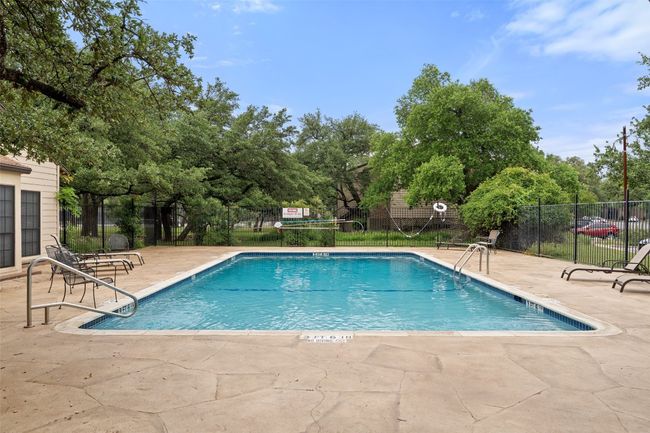 Pool featuring fence and a patio | Image 32