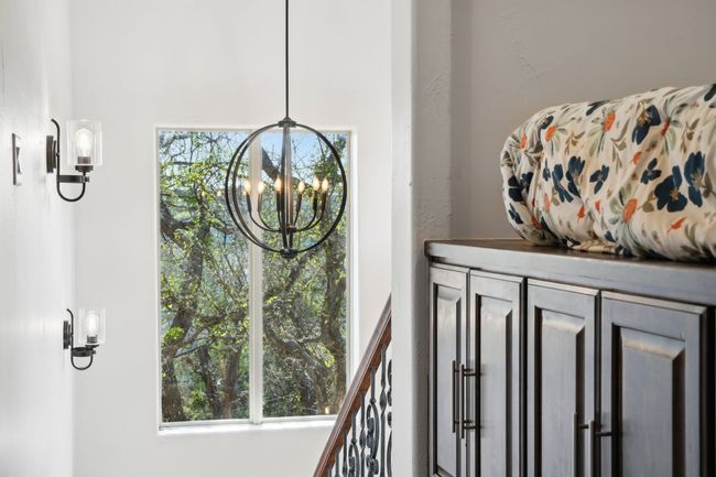 Interior details featuring a chandelier | Image 27