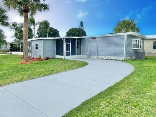 1038 Warbler Ct, Barefoot Bay, FL, 32976-7269 | Card Image