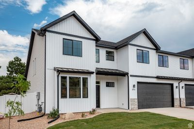 View of front of house with a garage | Image 3