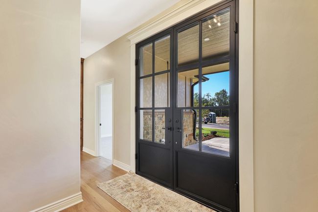 Foyer entrance with light hardwood / wood-style flooring | Image 5