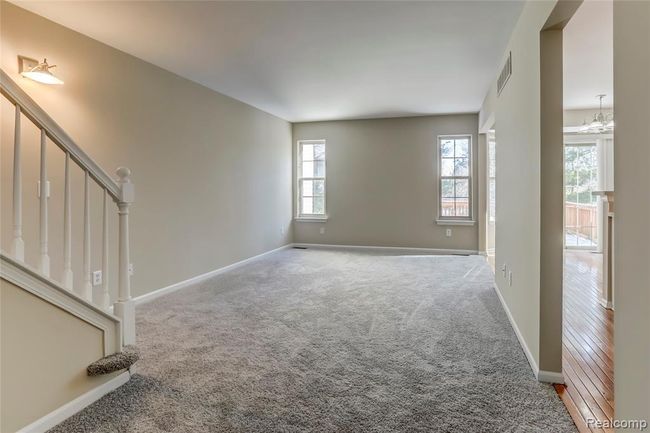 Brand New carpeting in light filled great room located off the kitchen. | Image 2