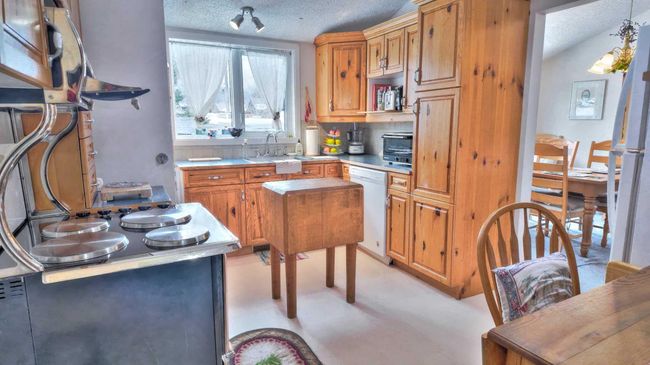 1001 9 Avenue, House other with 4 bedrooms, 2 bathrooms and 4 parking in Canmore AB | Image 7