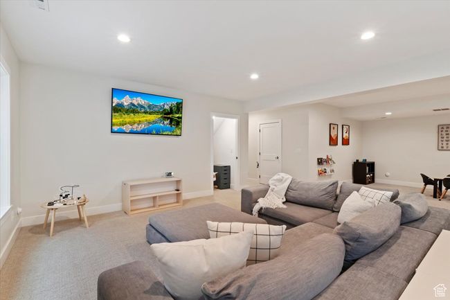 Living room featuring baseboards, carpet floors, and recessed lighting | Image 25