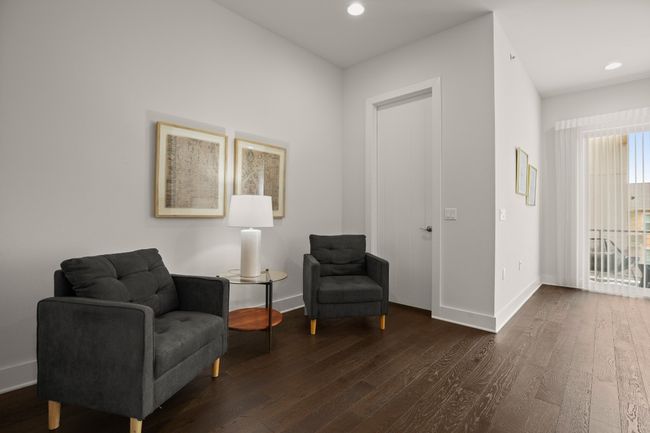 Sitting room featuring dark wood-type flooring, baseboards, and recessed lighting | Image 11