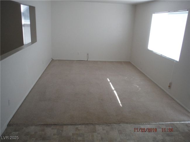 Carpeted spare room with a healthy amount of sunlight | Image 4