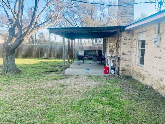 View of yard featuring a patio and a fenced backyard | Image 19