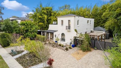 Welcome Home to this Stunning Oasis located in the Highly Sought after 32804 Zip Code of the Renowned College Park Area! Nestled in the Orlando Country Club Community, this charming 1925 Estate has been tastefully renovated with no expense spared all while preserving its original character and beauty! | Image 2