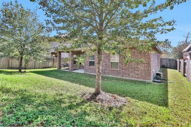 8458 Coral Cove Pass Ln, House other with 3 bedrooms, 2 bathrooms and 2 parking in Conroe TX | Image 39