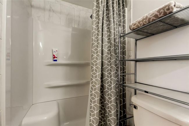 38.. FULLY UPDATED Owners Retreat Ensuite (4.1 x 7.11') Provides Spotless Walk In Shower w Bench & Built In Shelves for all Your Things | Image 37