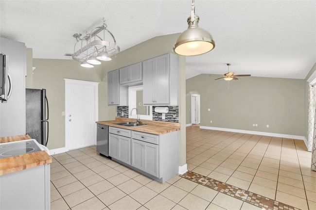 3013 Hunkin Cir, House other with 3 bedrooms, 2 bathrooms and null parking in DELTONA FL | Image 8