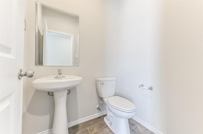 Downstairs powder room. | Image 24