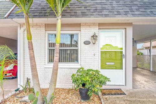 883 Sky Loch Dr S, DUNEDIN, FL, 34698-8141 | Card Image