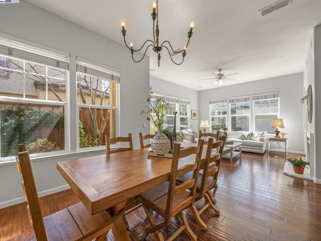 SPACIOUS DINING ROOM AREA WITH NEW CHANDELIER | Image 7
