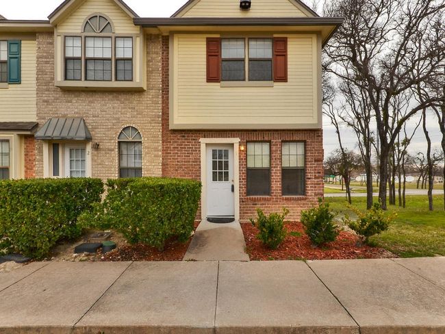 View of property featuring brick siding | Image 5