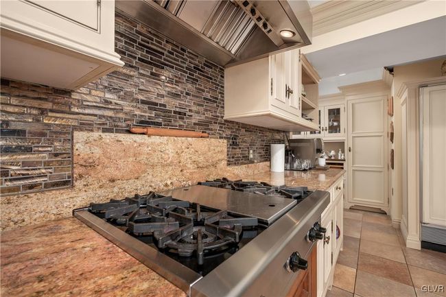 Wolf 6 Burner gas cooktop; plenty of storage | Image 10