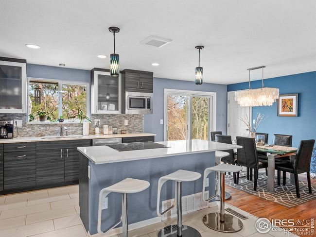 Remodeled open kitchen w/ sitting island and counter top space | Image 6