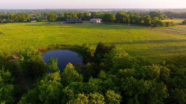 Birds eye view of property with a water view and a rural view | Image 18