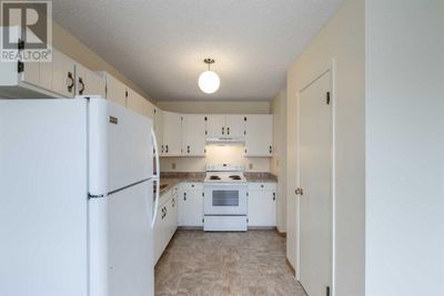 284930 59 St, Home with 4 bedrooms, 2 bathrooms and 2 parking in Innisfail AB | Image 3