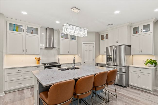 Whirlpool stainless steel appliances and ample storage. | Image 7