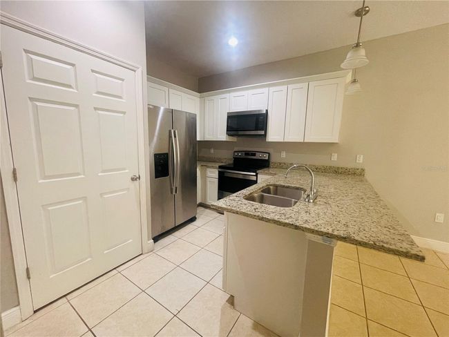 1589 Cumin Dr, Home with 2 bedrooms, 2 bathrooms and null parking in POINCIANA FL | Image 10
